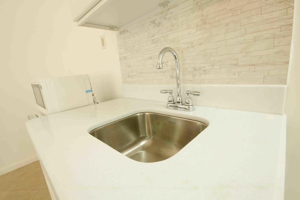 Cattleya Luxury Suites Kingston Chambre photo